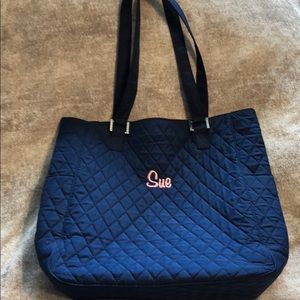 Quilted Navy Bag monogrammed with “Sue” in pink
